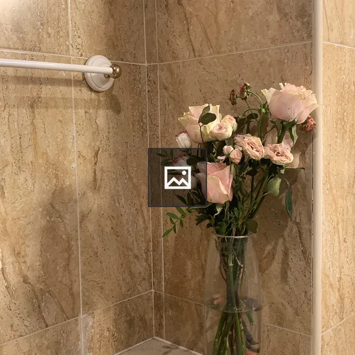 Bouquet of Pink Roses in Glass Vase