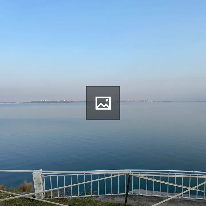 Lake Landscape with Sky and Fence