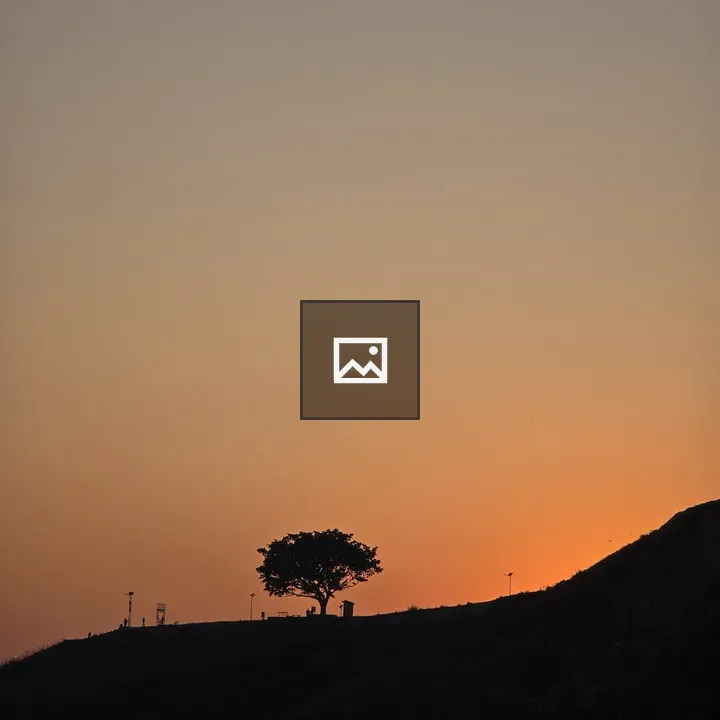 Silhouette Tree on Sunset Hill