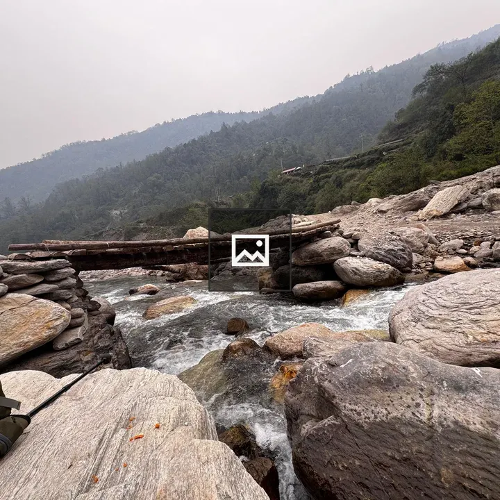 Stone Bridge Over River