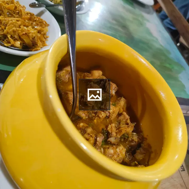 Yellow Pot with Chicken in Sauce