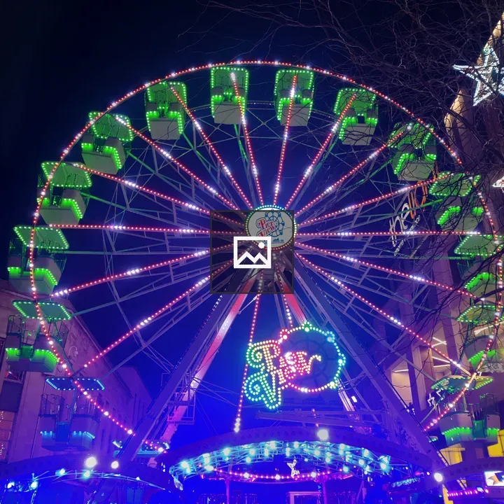 Ferris wheel lights at night