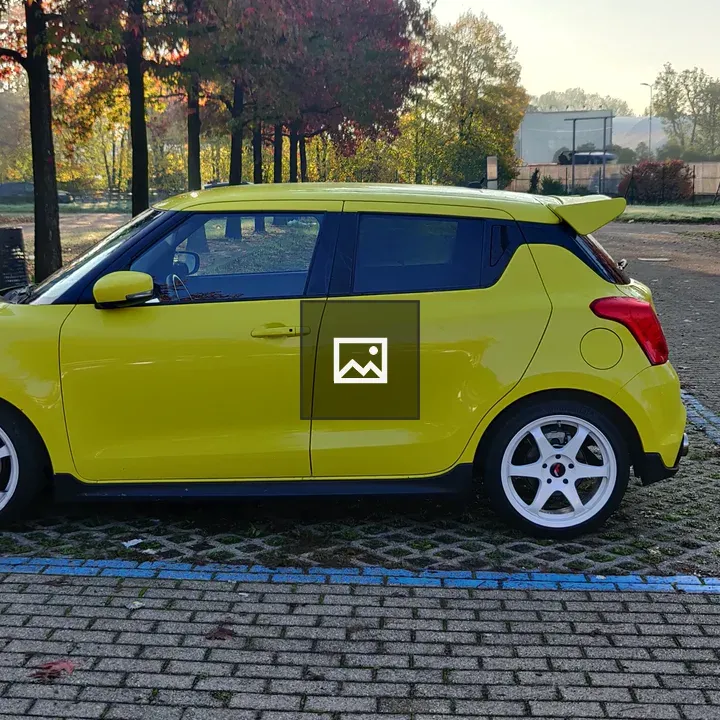 Yellow car in landscape view