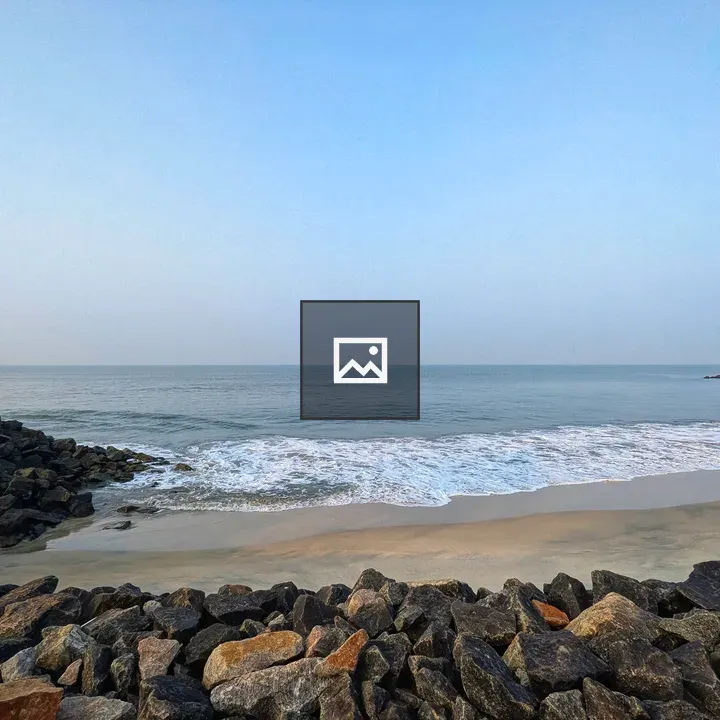 A tranquil beach with rocks