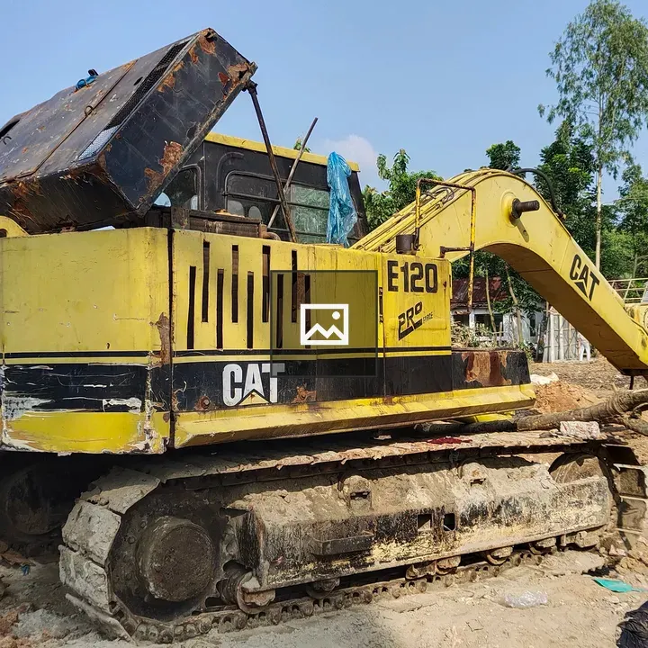 Yellow and black excavator on dirt