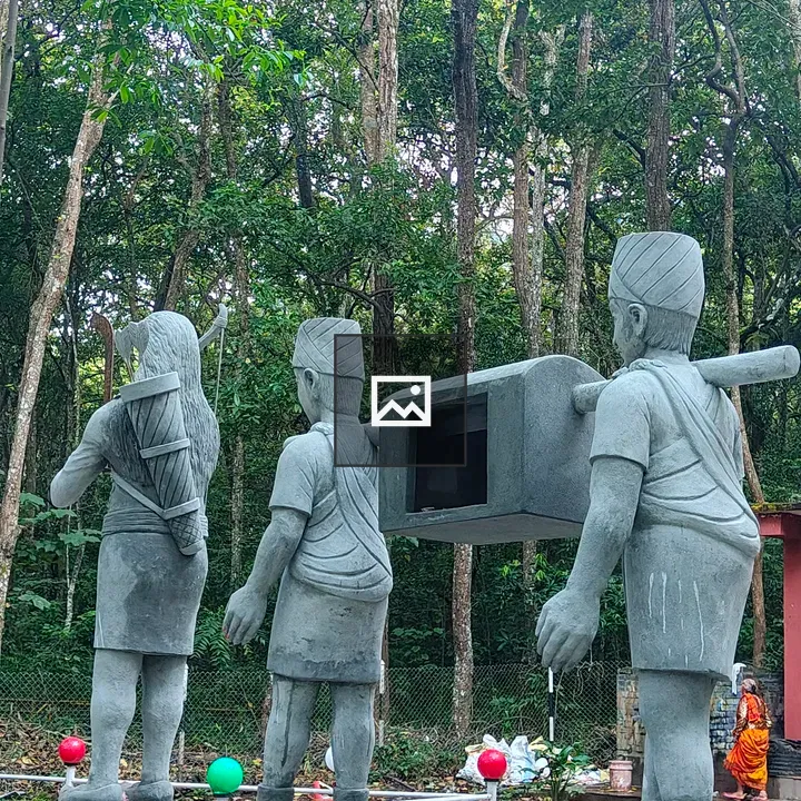 Three Stone Sculptures in Forest