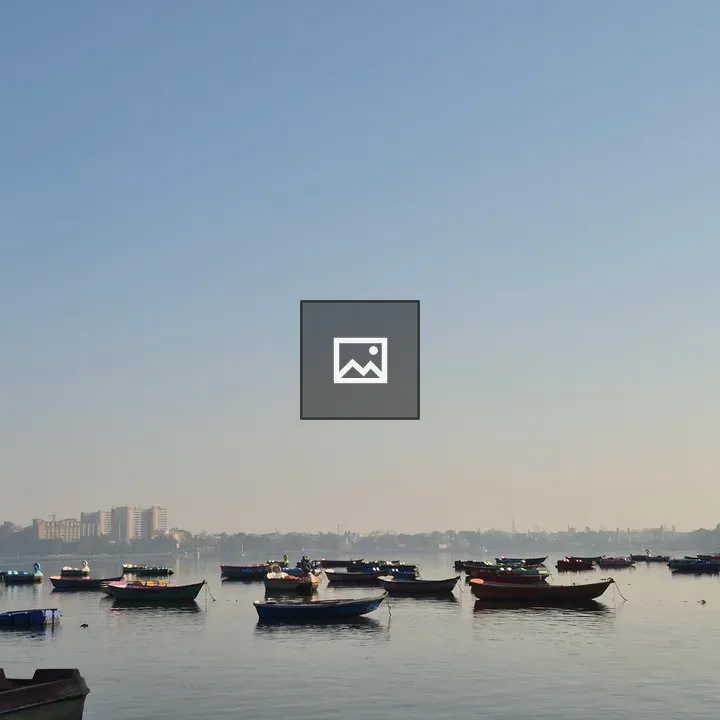 Calm lake at dawn with skyline
