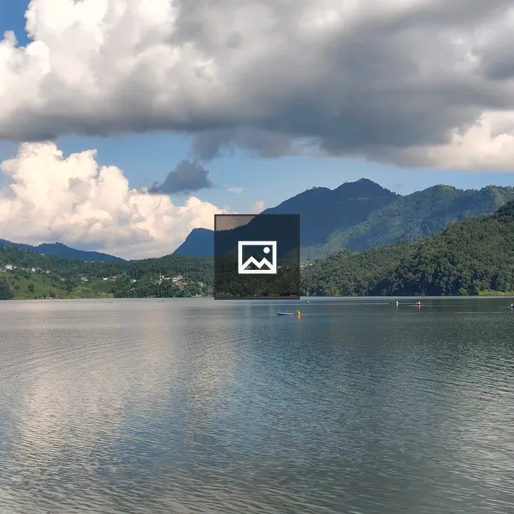 Serene lake among green hills