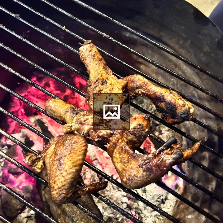 Grilling Chicken on Barbecue