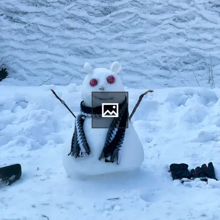Snowman in Snowy Landscape