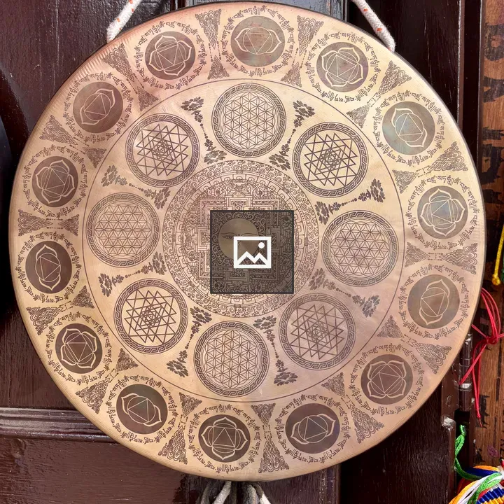 Gong on Textured Wall
