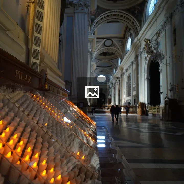 Ornate church interior with candles