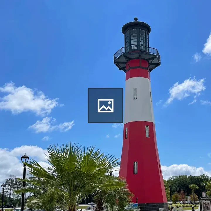 Lighthouse against Blue Sky