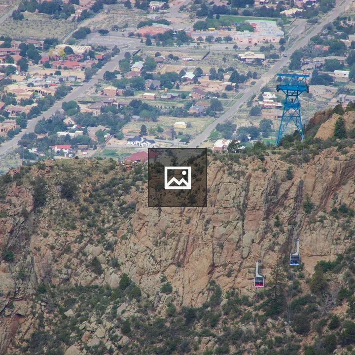 Two cable cars over Sandia Peak Tramway