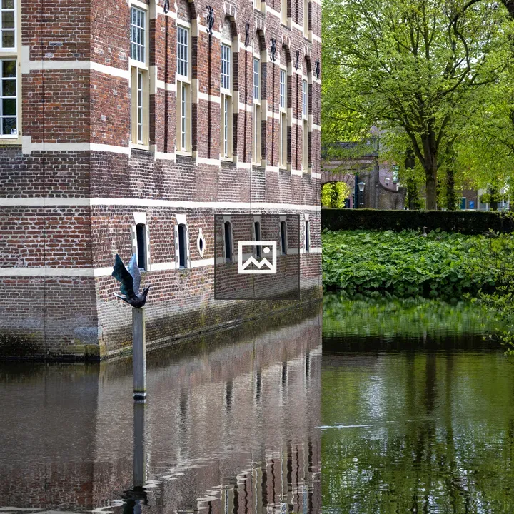 Castle Corner with Moat and Bird Sculpture