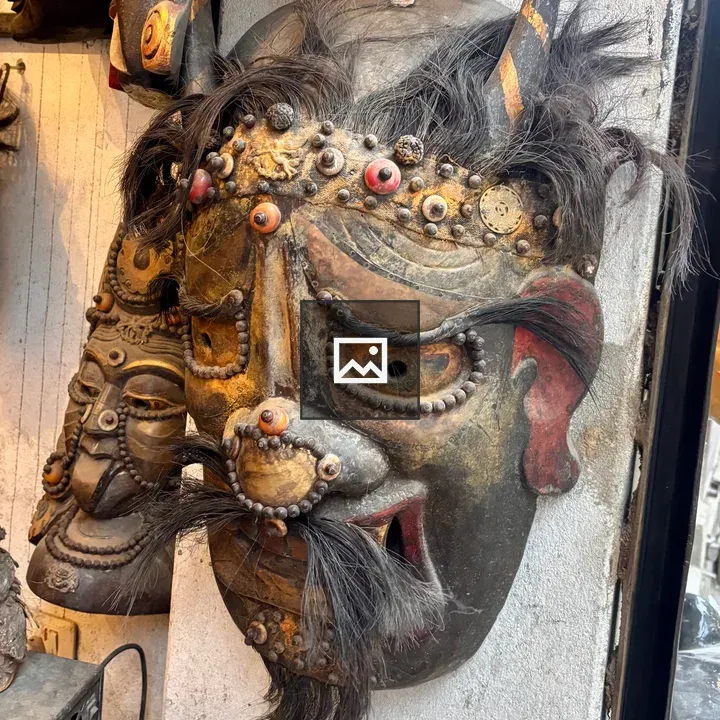 Mask with Horns and Intricate Designs