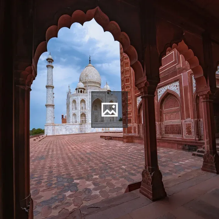 Side view of Taj Mahal through arch