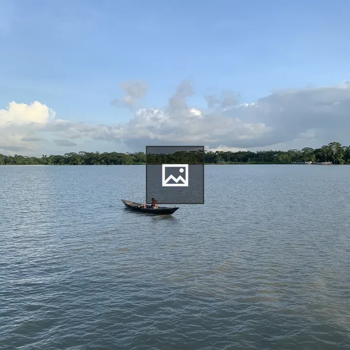 Fisherman in a Small Wooden Boat