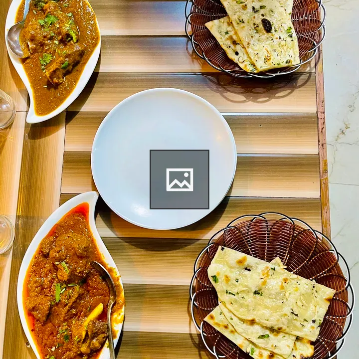 Wooden table with curry dish