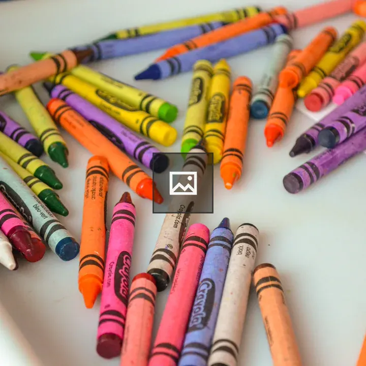 Tray of colorful crayons
