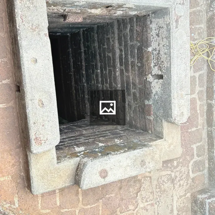 Stone-lined square opening