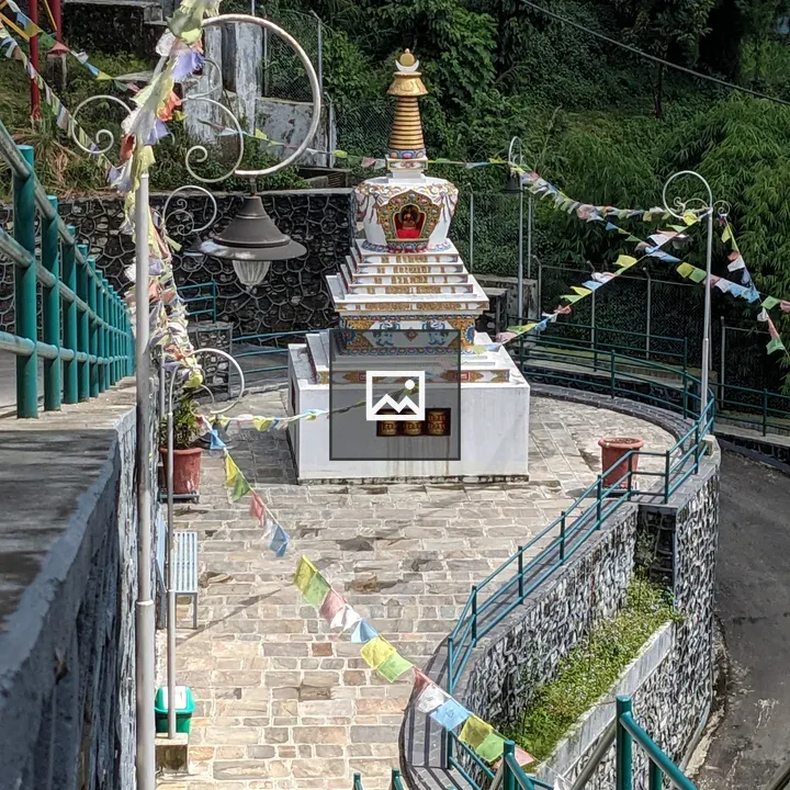White Stupa on Green Slope
