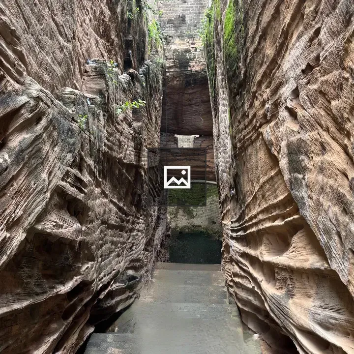 Stone Path Between Rocky Walls