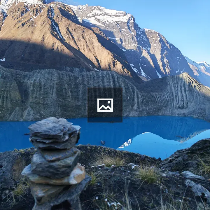 Cairn Rocks Over Lake