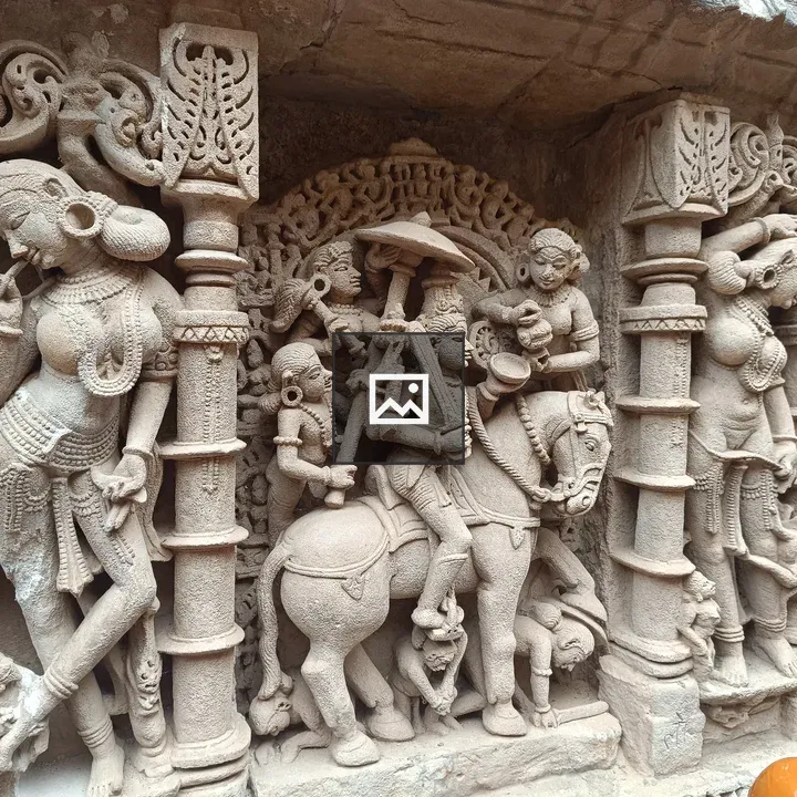 Stone relief sculpture with figures