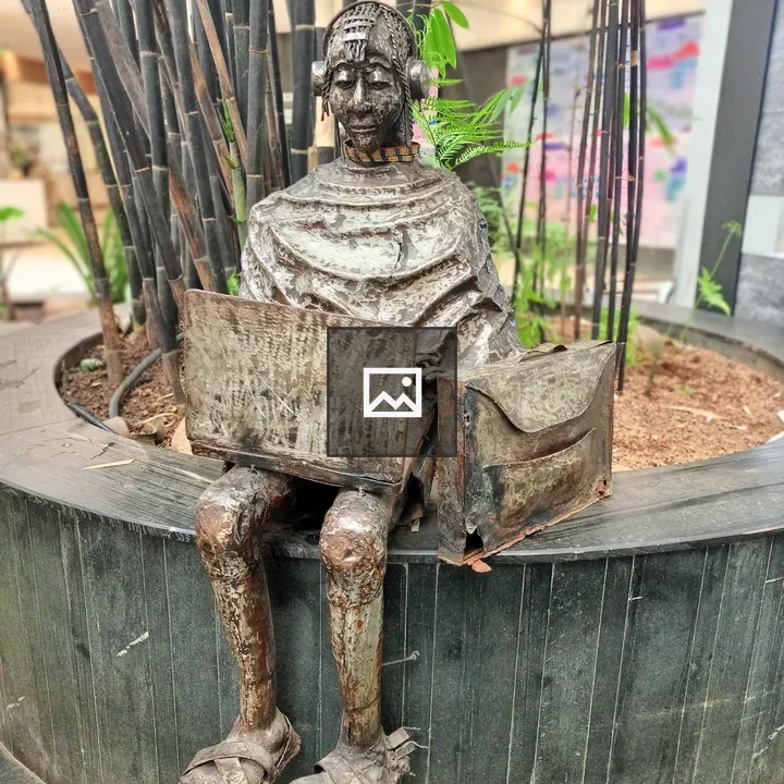 Seated Masai Lady Sculpture with Laptop