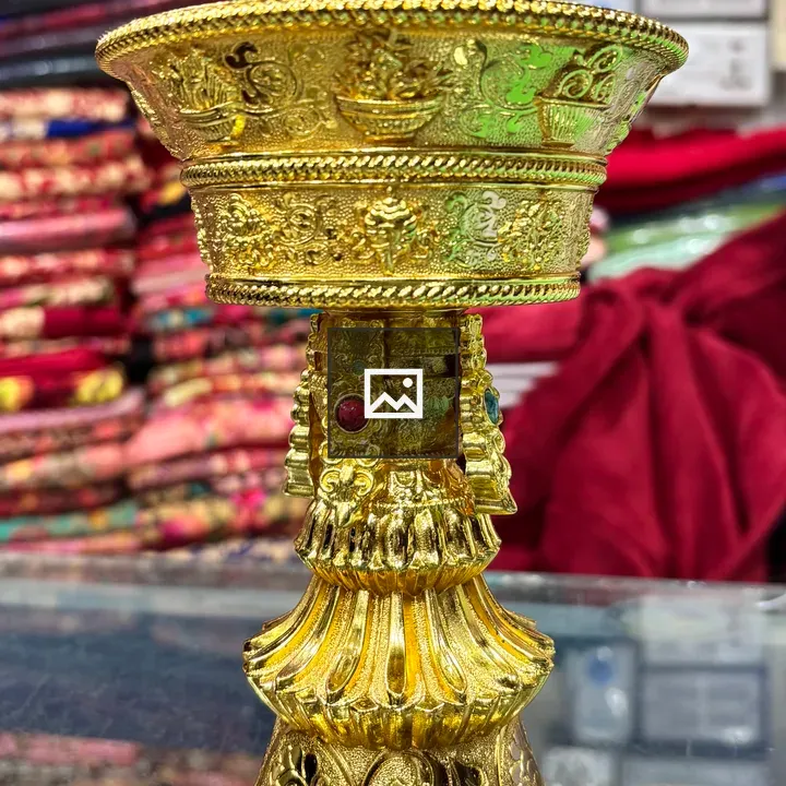 Decorative golden candle stand