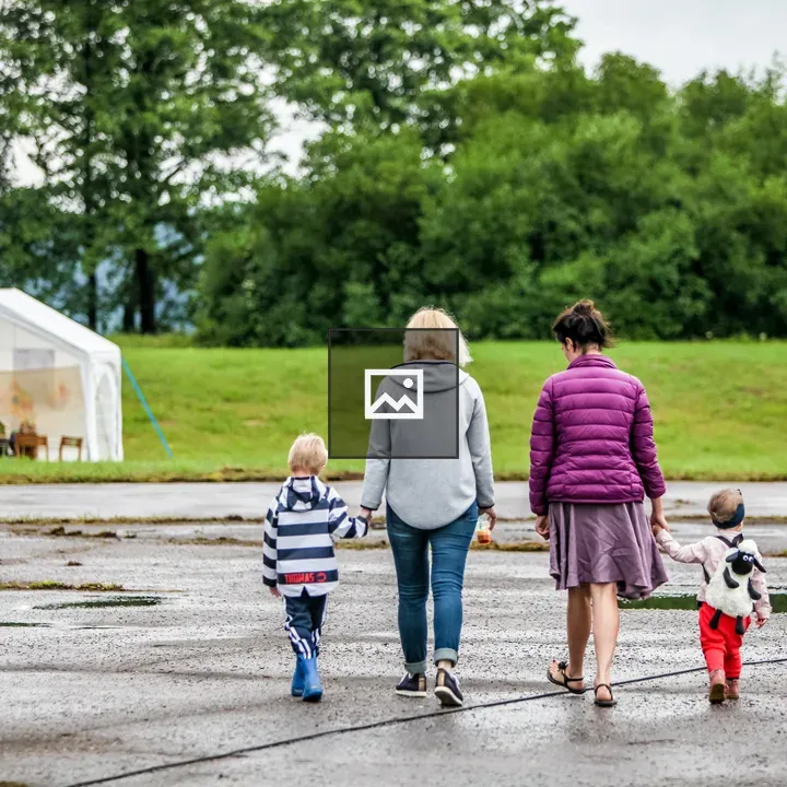 Two Women with Children in Park