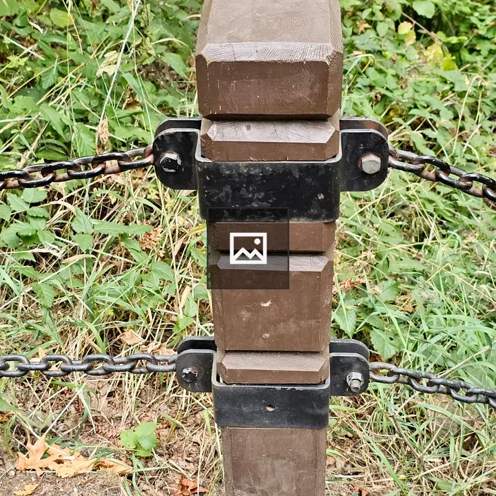 Wooden post with metal brackets
