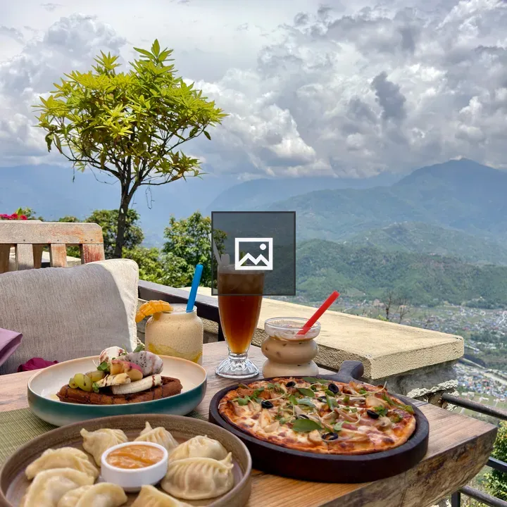 Outdoor dining setup with mountain view
