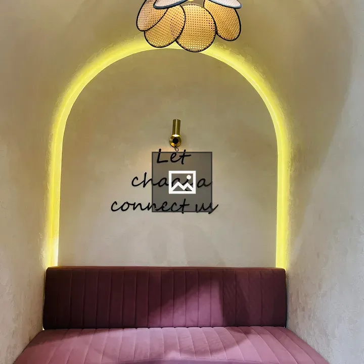 Cozy pink cushioned bench nook