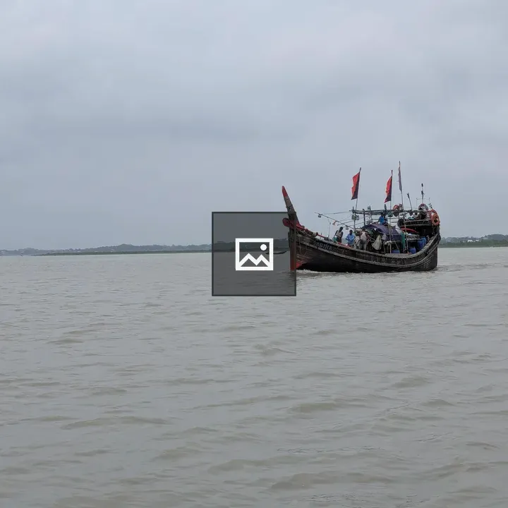 Wooden fishing boat with flags