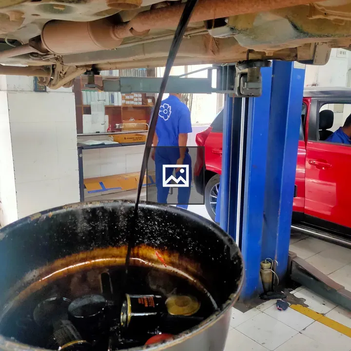 Used oil being drained at workshop