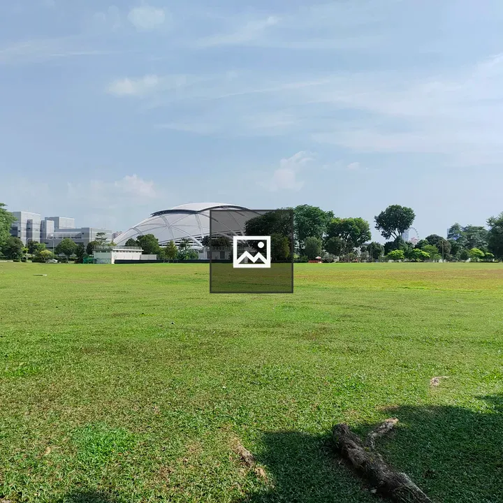 Domed building over grassy field