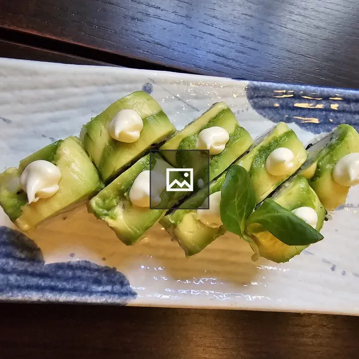 Avocado sushi rolls on plate