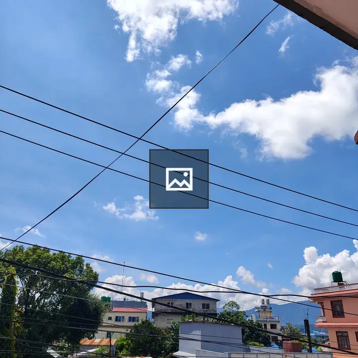 Power lines over blue sky scene
