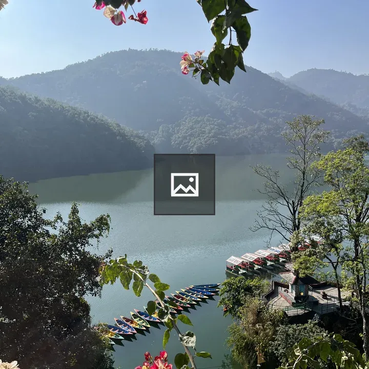 Phewa Lake with Boats and Hills
