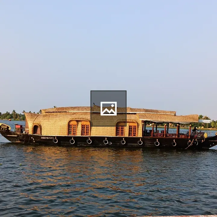 Traditional houseboat on calm water