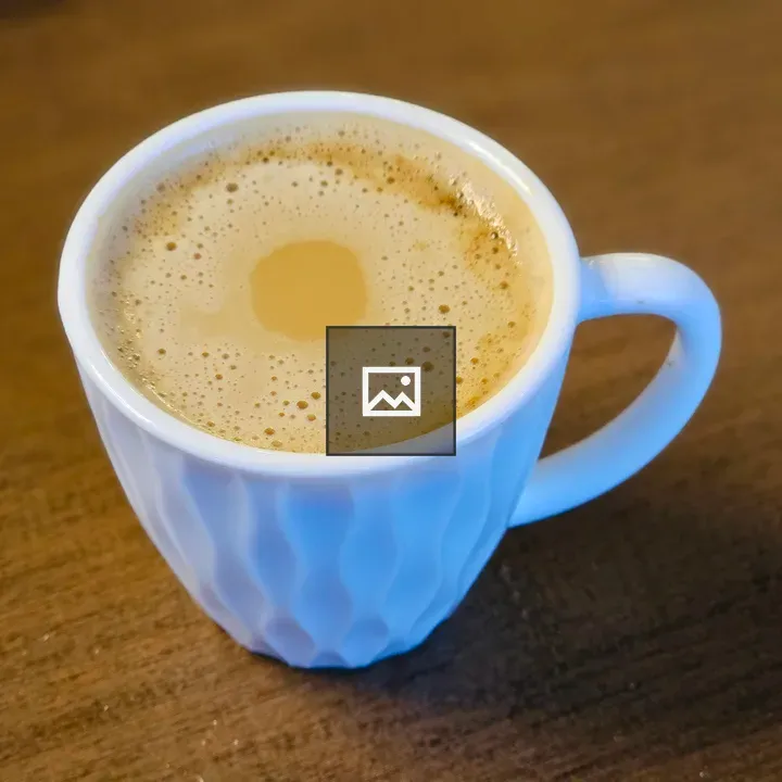 South Indian filter coffee in white cup